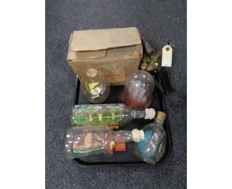 A tray of four ship in bottles, ship under dome, vintage parasene blow lamp in box 