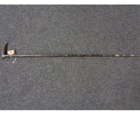 An antique whistling walking stick 