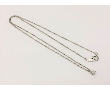 A Tiffany &amp; Co diamond solitaire pendant on platinum chain, approximately 0.15ct. CONDITION REPORT: with original retail 