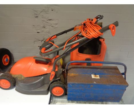 A Flymo mower with lead and grass box together with a concertina metal tool box and tools 