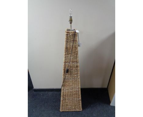 A wicker floor lamp 