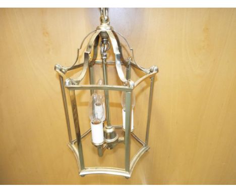 A good quality solid brass Chelsea lantern with all six pieces of curved glass present. Estimate £50 - £80