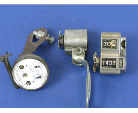 *A Lucas Ltd mileage recorder, and a rare Veeder with a five-window mileage indicator and a three-window trip,  together with