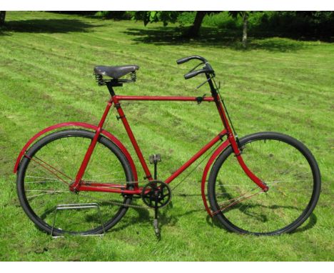 *c1905 Gentleman's Bicycle. A quality machine of unknown manufacturer,  it possesses a 26-inch red finished frame, with perio