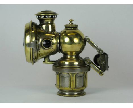 *A J. Lucas Ltd 'Calcia King' Bicycle Lamp. Dated 1912, this acetylene gas lamp is in good, seemingly useable condition,  wit