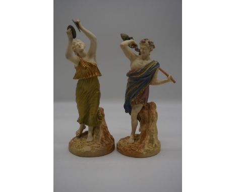 Two Royal Worcester shot enamel figures, models 1440 and 2016, largest 27.5cm high.&nbsp;&nbsp; 