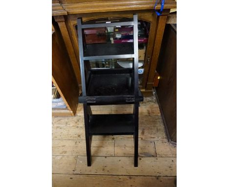 A reproduction stained metamorphic library step chair.&nbsp; 