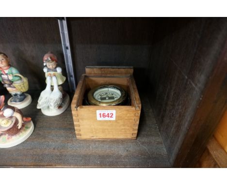 A boxed gimbal compass, stamped 'Made in USA'.&nbsp; 