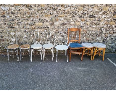 A quantity of metal garden chairs;&nbsp;together with a pair of bamboo stools and one other chair.&nbsp; 