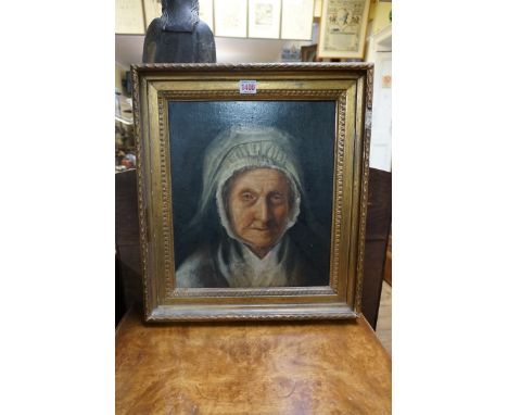 European School, 19th century, head and shoulders portrait of an elderly lady wearing a bonnet, oil on canvas, 36.5 x 31.5cm.