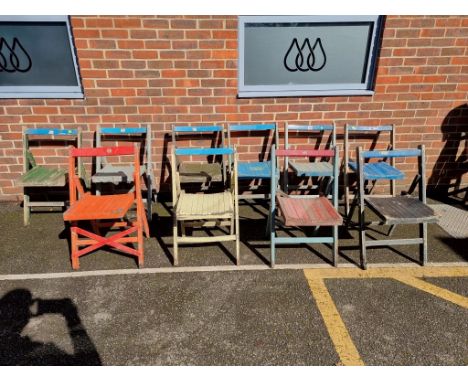 A set of ten painted wood folding garden chairs.&nbsp; 