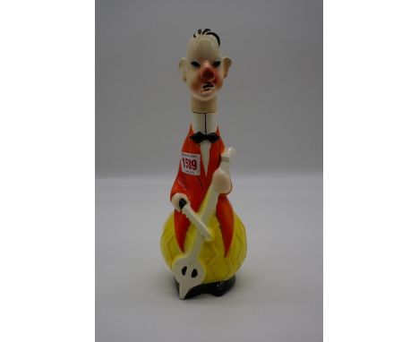 A 1920s Goebel figural bottle and stopper, 26cm high. 