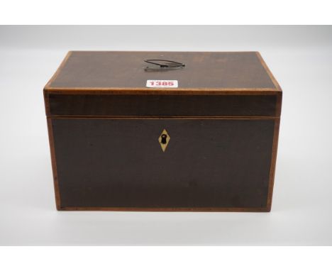 A George III harewood, crossbanded and line inlaid tea caddy,&nbsp;33.5cm wide. 
