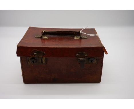 A Chinese bone and bamboo mahjong set,&nbsp;in leather case. 