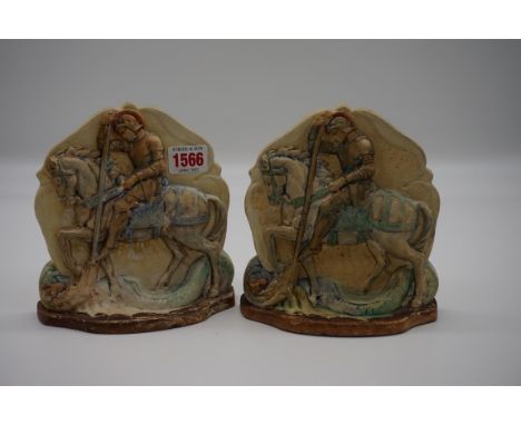 A rare pair of Compton pottery 'George and The Dragon' bookends,&nbsp;17cm high.&nbsp; 