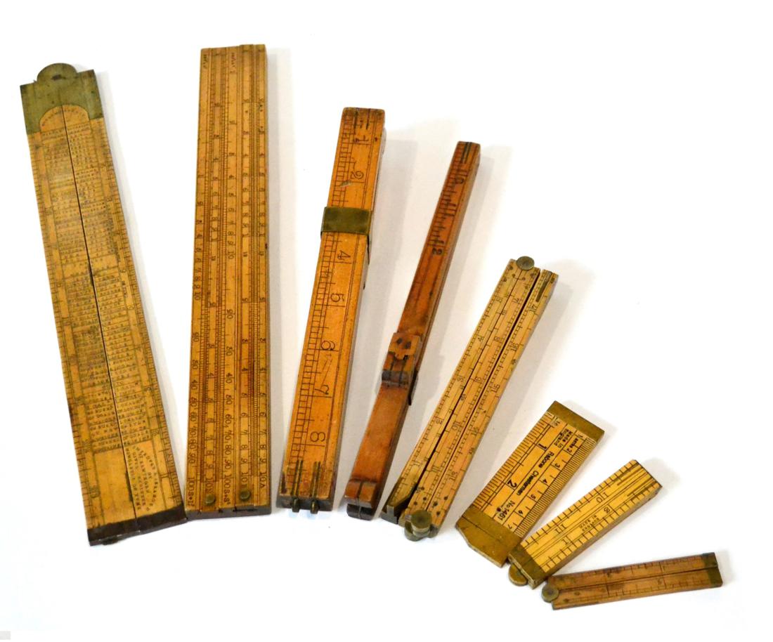 A Collection Of Wooden Rulers, Dipsticks and Slide Rules including a J ...