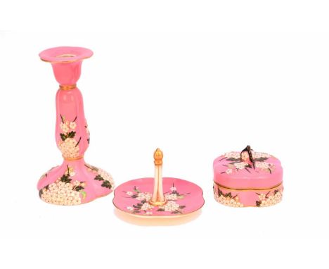 A Coalport part dressing table set, circa 1882, pink ground with flowers in relief, comprising trinket box and cover, ring st