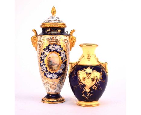 Two small Coalport vases, late 19th/early 20th century, the first with twin rams head handles, with a floral printed gound an