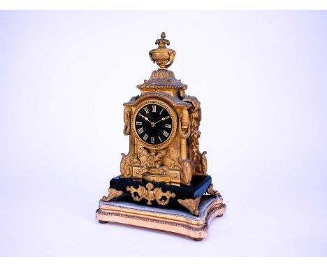 A French neoclassical gilt metal mantel clockLate 19th century, the case surmounted by an urn, the 88mm black enamel dial wit