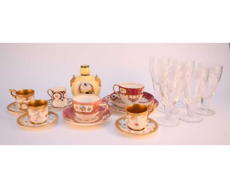 A group of Coalport, comprising three coffee cups and saucers, printed and and hand-coloured with roses, with tooled gilt int