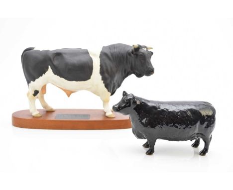 A Beswick Connoisseur model of a Friesian Bull, mounted on oval plinth with name plaque; sold together with a Beswick model o