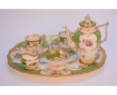 A rare Coalport green batwing cabaret or tête-à-tête service, early 20th century comprising two demitasse cups, two saucers, 