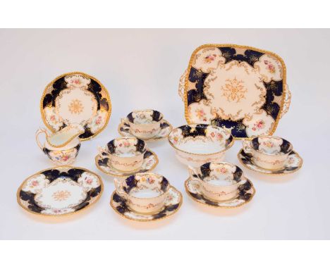 A Coalport blue batwing tea service, late 19th/early 20th century, comprising nine teacups, twelve saucers, twelve sideplates