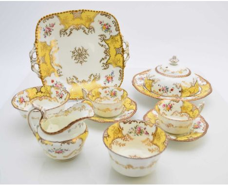 A Coalport batwing tea/breakfast service in the rare yellow colourway, early 20th century, comprising six teacups, six saucer