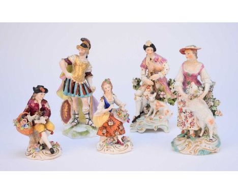A mixed group of ceramics, comprising two Derby porcelain figures, 18th century, the first of a gentleman bagpiper, seated wi