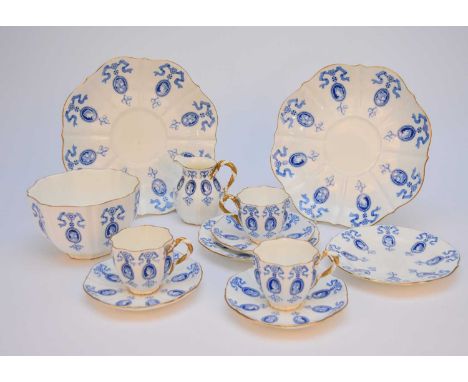 A Coalport tea service, late 19th century, transfer-printed in blue with classical portrait cameo medallions suspended from f