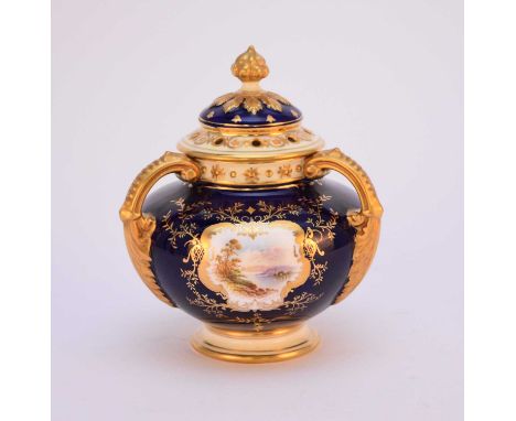 A small Coalport tri-form handled pot pourri vase and cover, circa 1891-1919, painted by E.O Ball with a landscape panel of L