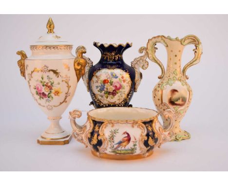 A group of ceramics, comprising a Coalport vase and cover, late 20th century, of urn form with rams head handles and an acorn