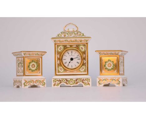A Royal Crown Derby 'Green Derby Panel' mantel timepiece, 18.5cm high with a pair of matching candle holders, 9.5cm high, two