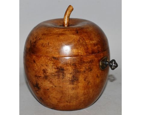 AN APPLE SHAPED FRUITWOOD TEA CADDY. 5ins high.