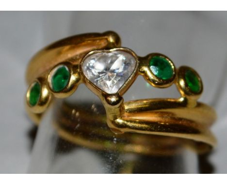 A 9CT GOLD HEART SHAPED RING.