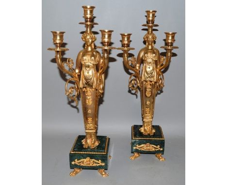 A GOOD PAIR OF EMPIRE DESIGN ORMOLU AND MARBLE THREE LIGHT CANDLESTICKS with classical female figures and square marble bases