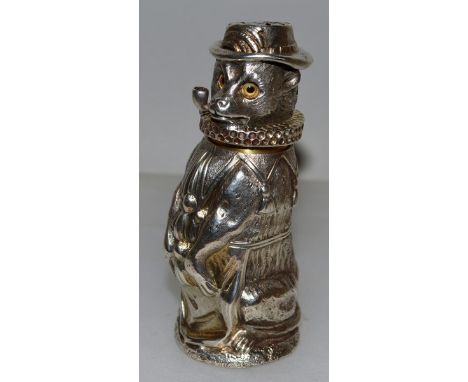 A VICTORIAN NOVELTY SILVER MODEL OF A PERFORMING DOG PEPPERETTE, wearing a hat and neck ruff, pipe in his mouth 3.75ins high.