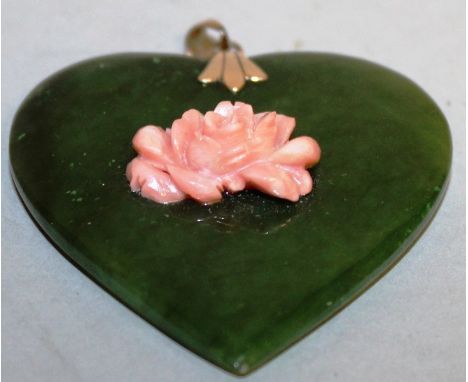 A GOOD JADE AND CORAL HEART SHAPED PENDANT.