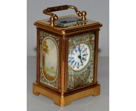 A “SEVRES” MINIATURE CARRIAGE CLOCK 2.25ins high.