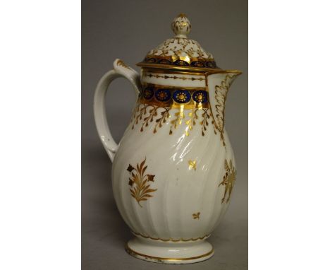 AN EARLY 19TH CENTURY CHAMBERLAINS WORCESTER COFFEE POT AND COVER with wrythen moulded body, decorated in blue and gilt, insc