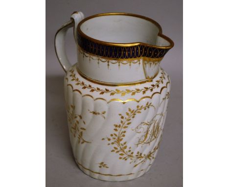 AN EARLY 19TH CENTURY CHAMBERLAINS WORCESTER DOCUMENTARY DATED JUG, gilded with initials FMD on a spirally moulded body under