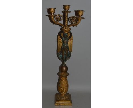 A GOOD EMPIRE STYLE SINGLE THREE LIGHT CANDELABRA with a winged classical female figure on a plinth and square base 25ins hig