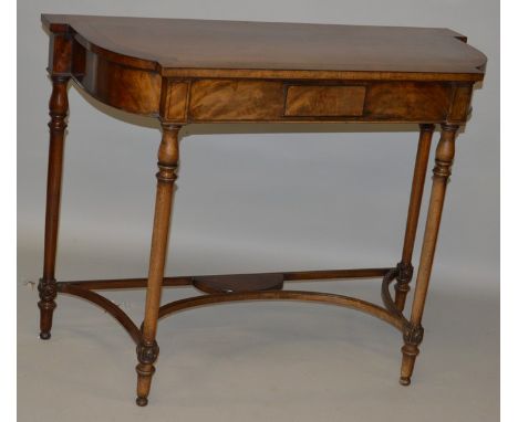 A GOOD GEORGIAN STYLE MAHOGANY CONSOLE TABLE with shaped crossbanded top, turned and fluted legs with uniting stretcher 3ft 6