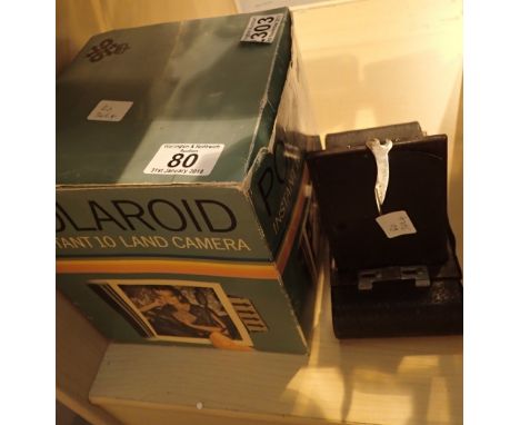 Kodak number 2 A folding autographic Brownie Bellows camera and a boxed Polaroid instant 10 land camera