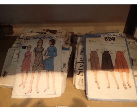 Shelf of vintage sewing patterns