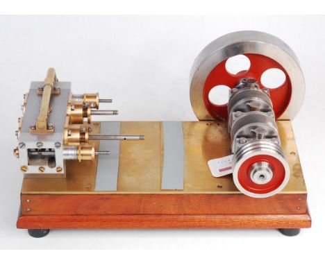 Incomplete, twin cylinder horizontal engine on hardwood base 1.25 inch stroke x 1 inch bore?, valve chests started, crank axl