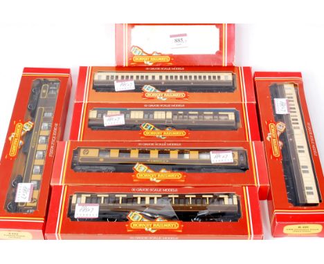 A Hornby R158 Great Western black half cab pannier tank engine (G-BG) together with R122, R123, R435, R436 GWR clerestory coa