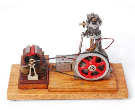 Stuart No. 10V type Dynamo engine, having single cylinder 0.75 inch bore x 1 inch stroke, 1 inch stroke, 3 inch, 6 spoke flyw