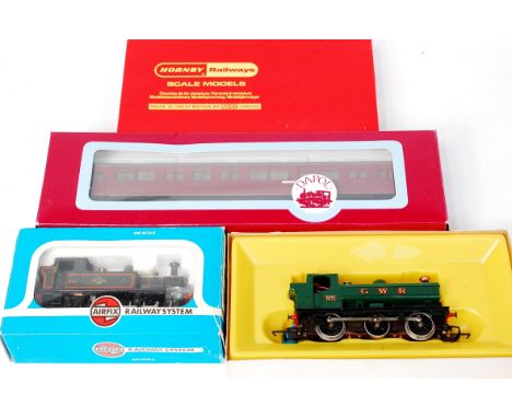 An Airfix BR green class 14XX  tank engine together with a BR maroon auto coach by Dapol (G-BFG) and a Hornby R051GW green pa