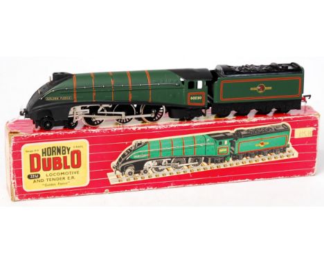 A  Hornby Dublo 2211 'Golden Fleece' engine and tender, with guarantee, instructions and test tag, losses to lining on locomo